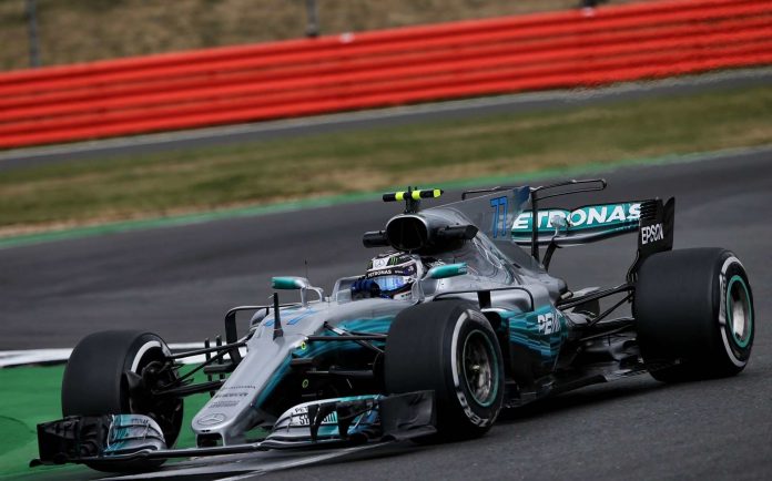 Motor Racing - Formula One World Championship - British Grand Prix - Practice Day - Silverstone, England